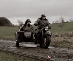 German motorbike and MG gunner