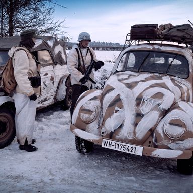 World War II German Soldiers Kubelwagen Winter Snow Camo